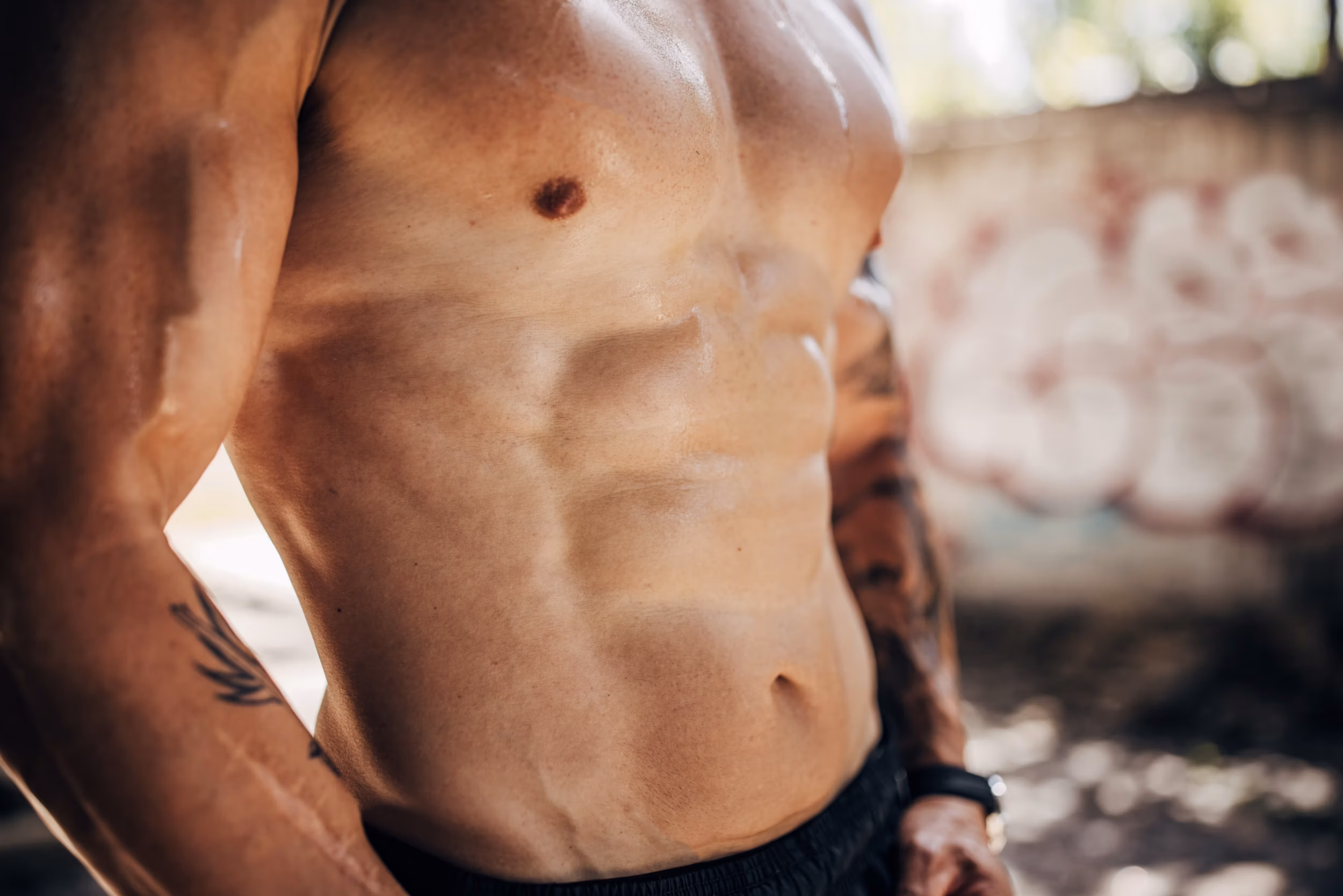 Male breast reduction results showing flatter, more defined chest